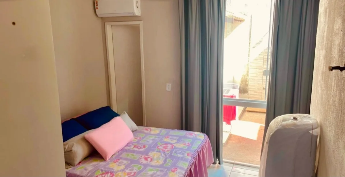 Quarto com ar-condicionado